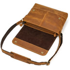 "Bolsa de Couro Crossbody Vintage Dommy, bolsa masculina de couro transversal com acabamento premium, design vintage e estilo elegante."