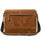 "Bolsa de Couro Crossbody Vintage Dommy, bolsa masculina de couro transversal com acabamento premium, design vintage e estilo elegante."