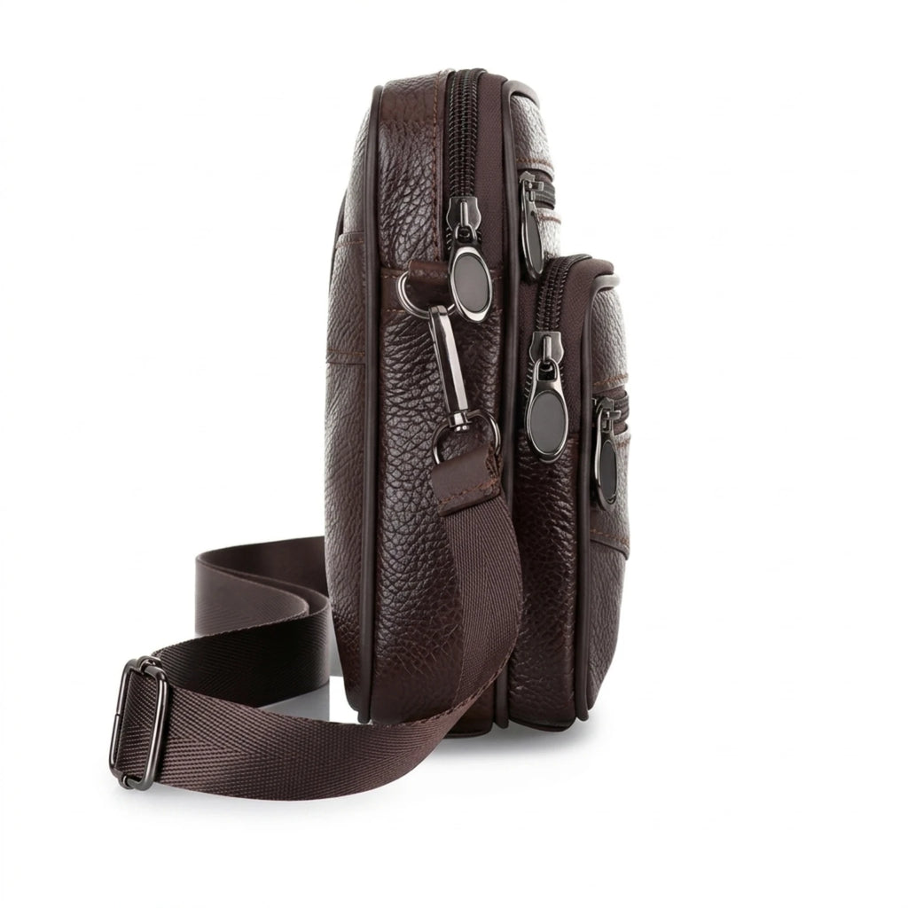 Bolsa de couro masculina transversal com design elegante, acabamento premium e espaço para itens essenciais.