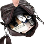 Bolsa de couro masculina transversal com design elegante, acabamento premium e espaço para itens essenciais.